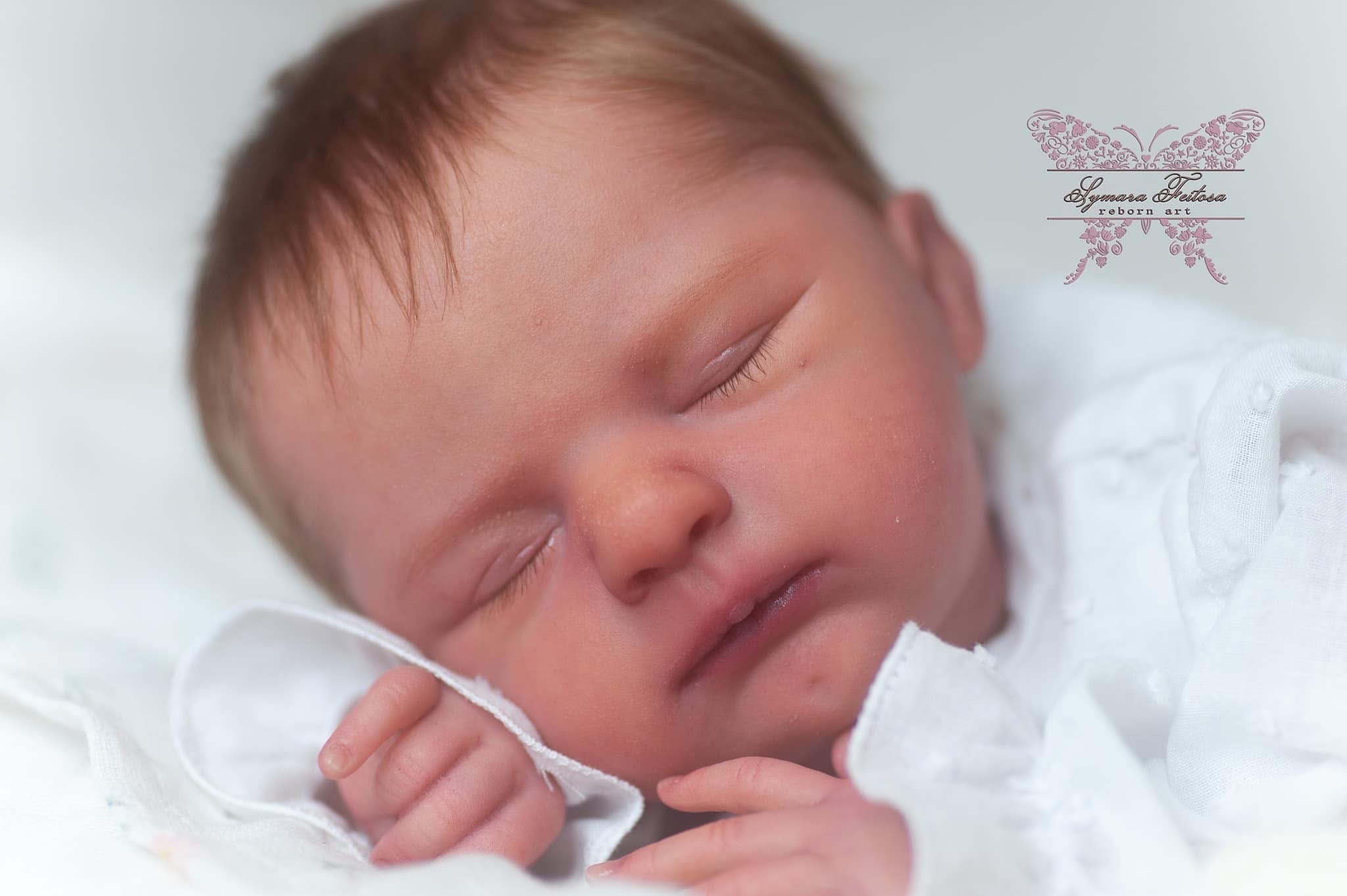 Reborn doll — blonde sleeping