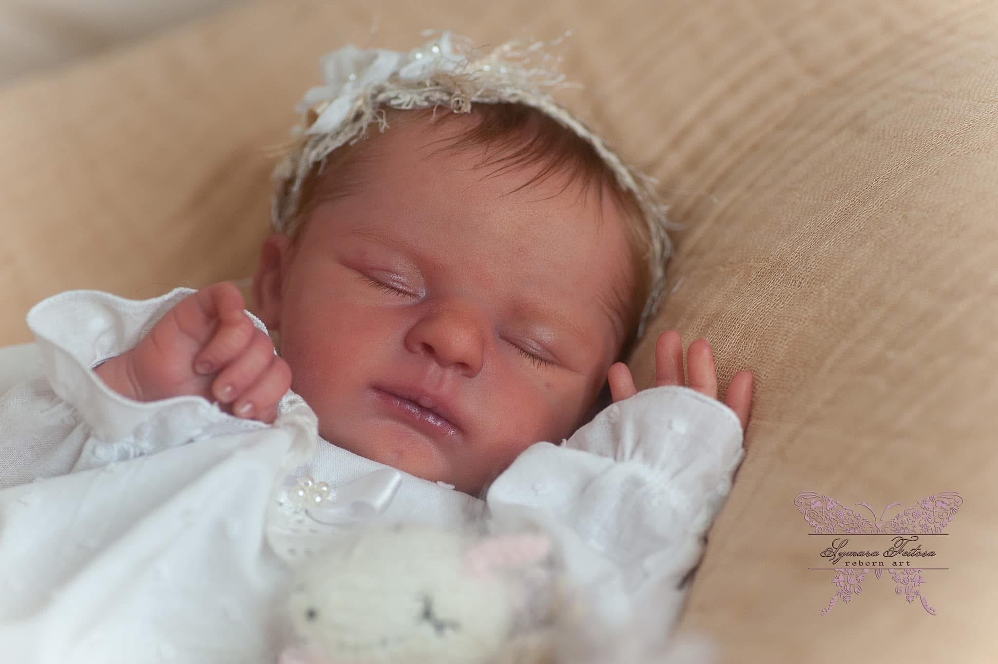 Reborn doll — white headband